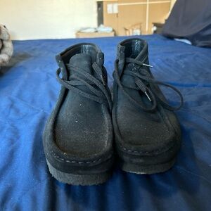 Clark’s wallabee moccasin shoes in black. The boy worn a handful of times.